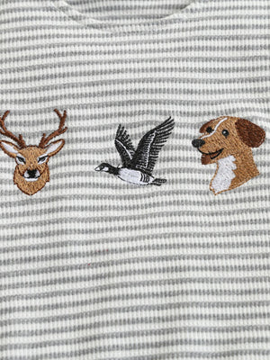 Baby one-piece with grey and white stripes and embroidered deer, duck, and dog faces.