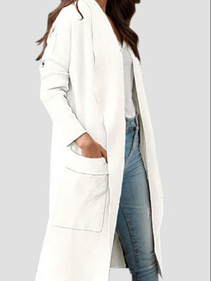 White open-front duster cardigan with pockets and relaxed fit.