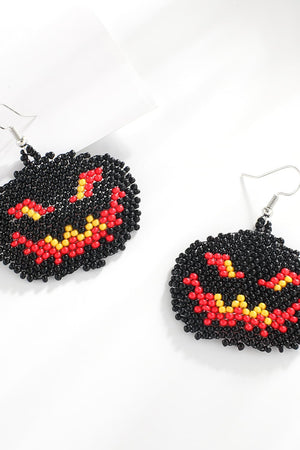 Black Pumpkin beaded earrings with red and yellow jack-o-lantern faces.