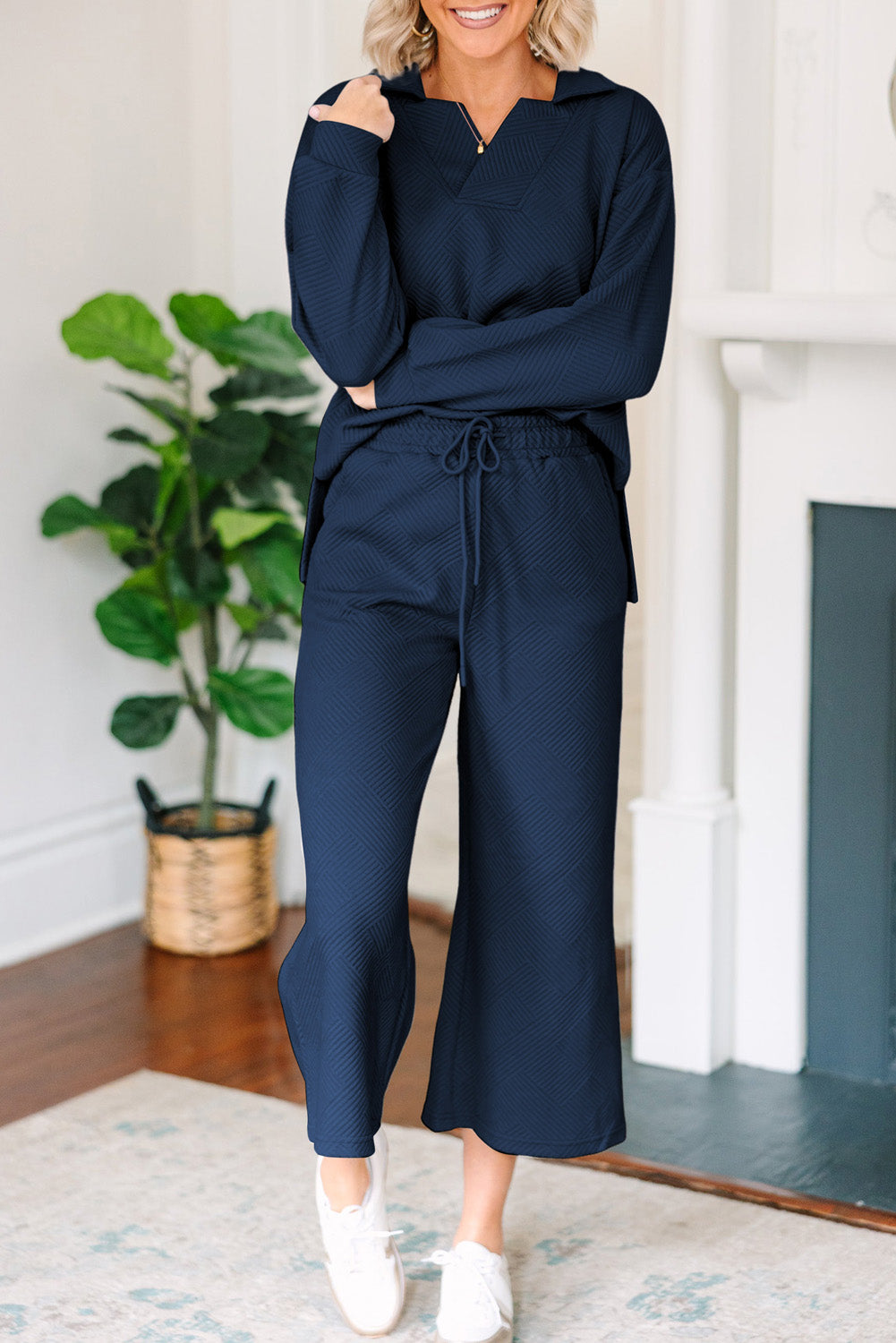 Navy textured polo top and wide-leg culottes set with drawstring waist.
