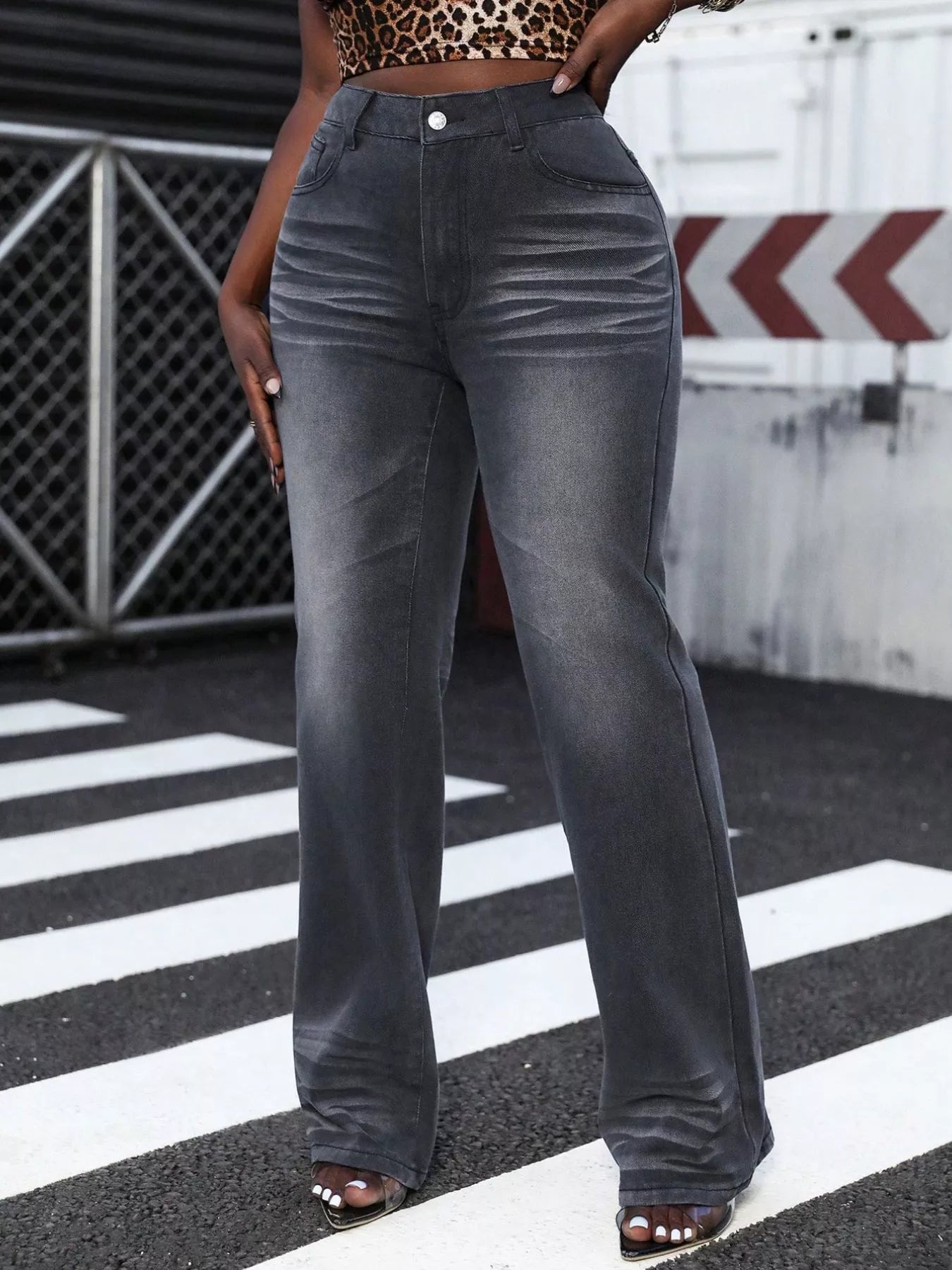 High-waist straight leg jeans in dark gray denim with subtle whiskering detail.