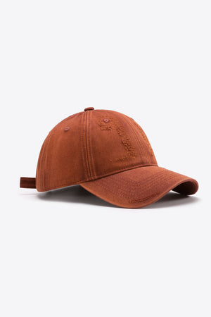 Terracotta baseball cap with distressed details and adjustable strap