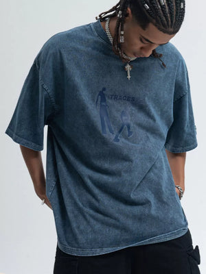 Oversized graphic tee in Snowflake Blue cotton with relaxed fit and crew neck.
