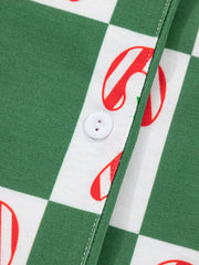 Green checkered pajama set with candy cane print and white button detail