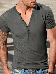 Men's dark gray slub cotton henley tee with button placket and short sleeves.