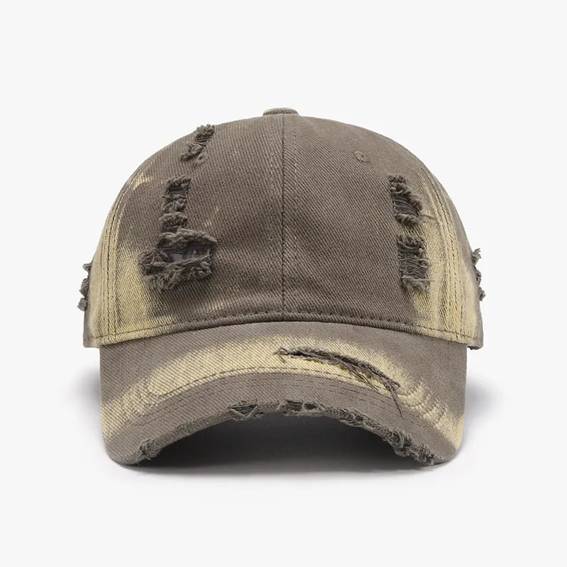 Shredded canvas baseball cap in mocha with distressed details and a faded effect.