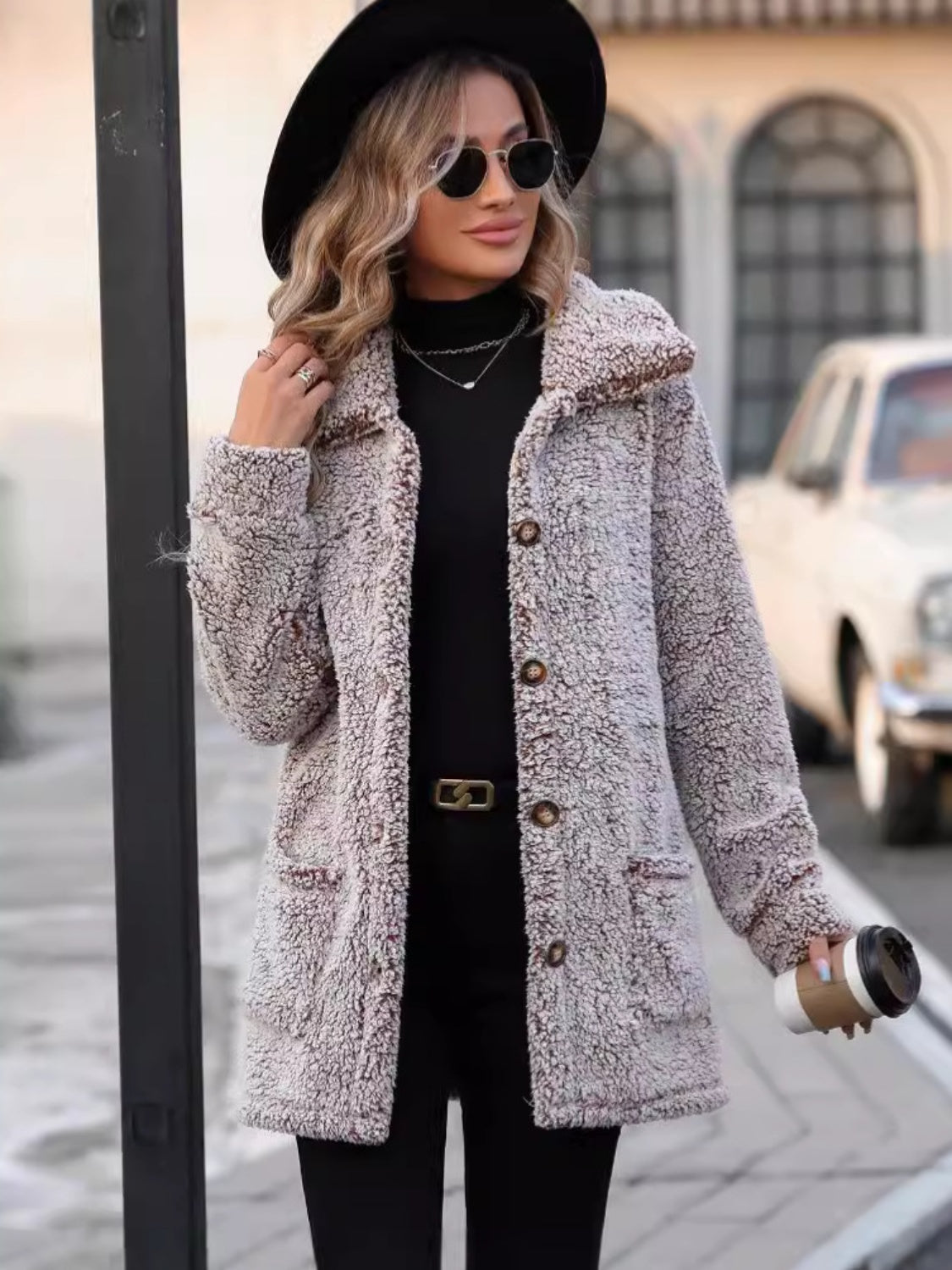 Taupe teddy bear textured button-down coat with contrast trim and pockets.