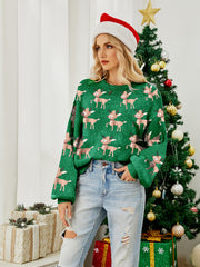 Green acrylic knit crewneck sweater with allover reindeer motif.