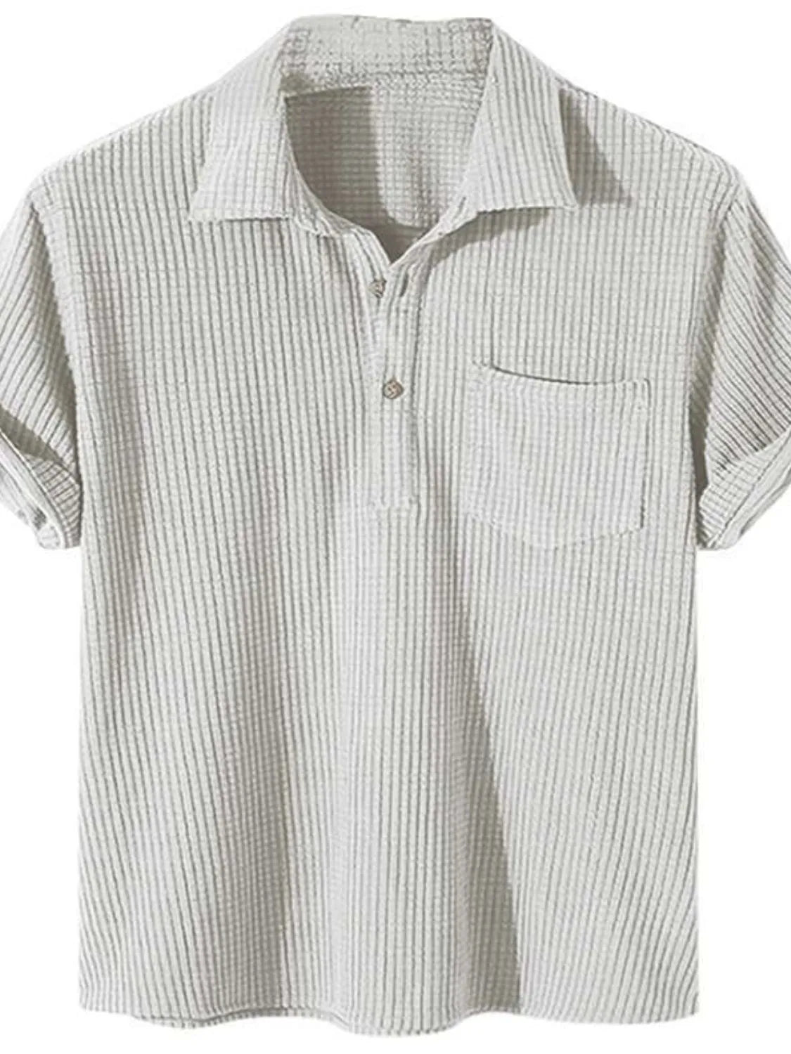 Textured ribbed polo shirt in ivory with rolled sleeves and chest pocket.