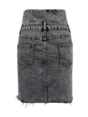 Button-front acid wash denim mini skirt in dark gray with frayed hem.