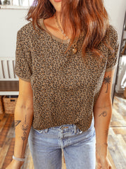 Leopard print relaxed fit t-shirt with short sleeves and a crew neck, styled with jeans.