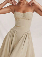 Light gray sweetheart midi dress with spaghetti straps and gathered skirt