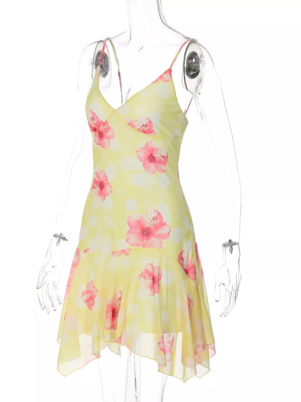 Yellow floral asymmetrical mini dress with ruffled hem and polka dots