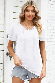 White flutter sleeve henley tee with tie neck detail