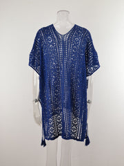 Open-knit V-neck beach cover-up in dark blue with tassel details