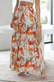 Botanical print palazzo trousers with a drawstring waist and wide legs in orange-red, aqua, and green.