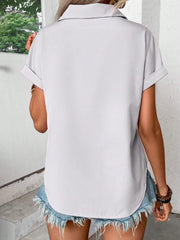 Light Gray polyester button-down shirt with cuffed short sleeves and a curved hem.