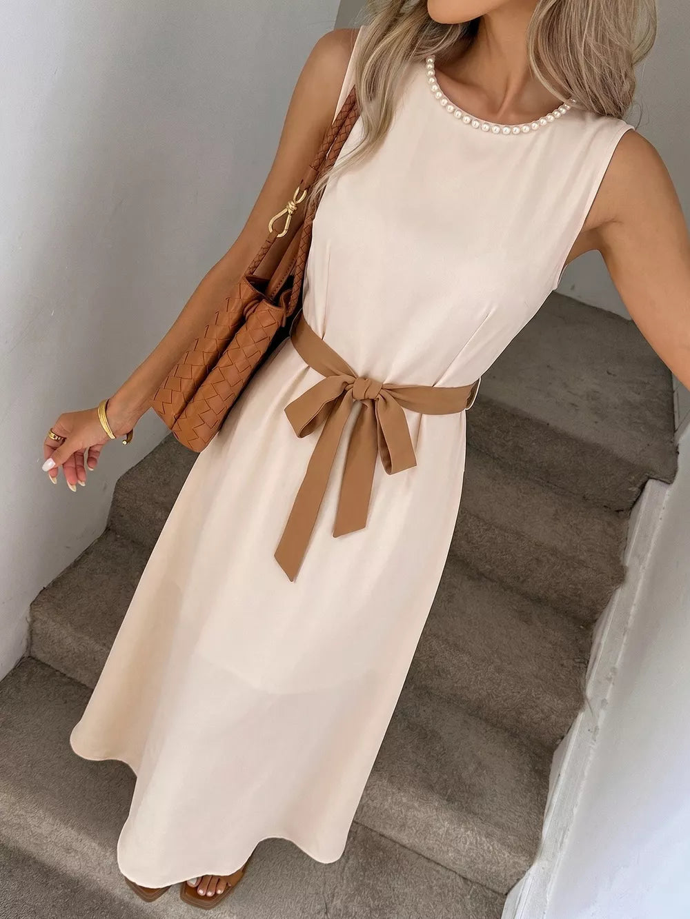 Cream A-line midi dress with pearl neckline and brown sash belt