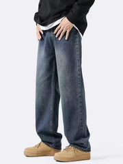 Men's dark wash loose-fit denim jeans with a vintage look.