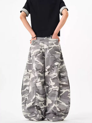 Urban camo oversized cargo sweatpants with multiple pockets and a relaxed fit.
