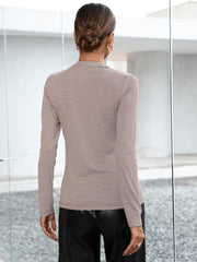 Ribbed Henley stripe top in gray with long sleeves and a buttoned neckline.