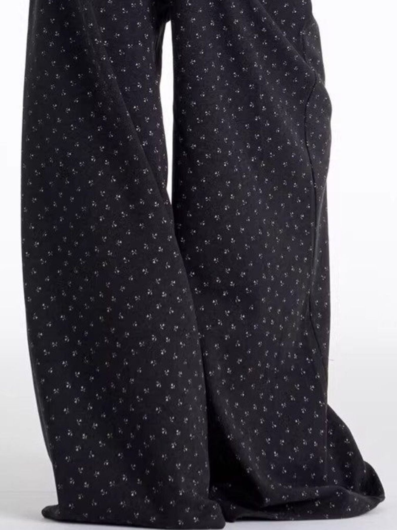 Men's dark floral wide leg sweatpants with a relaxed fit.