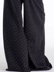 Men's dark floral wide leg sweatpants with a relaxed fit.