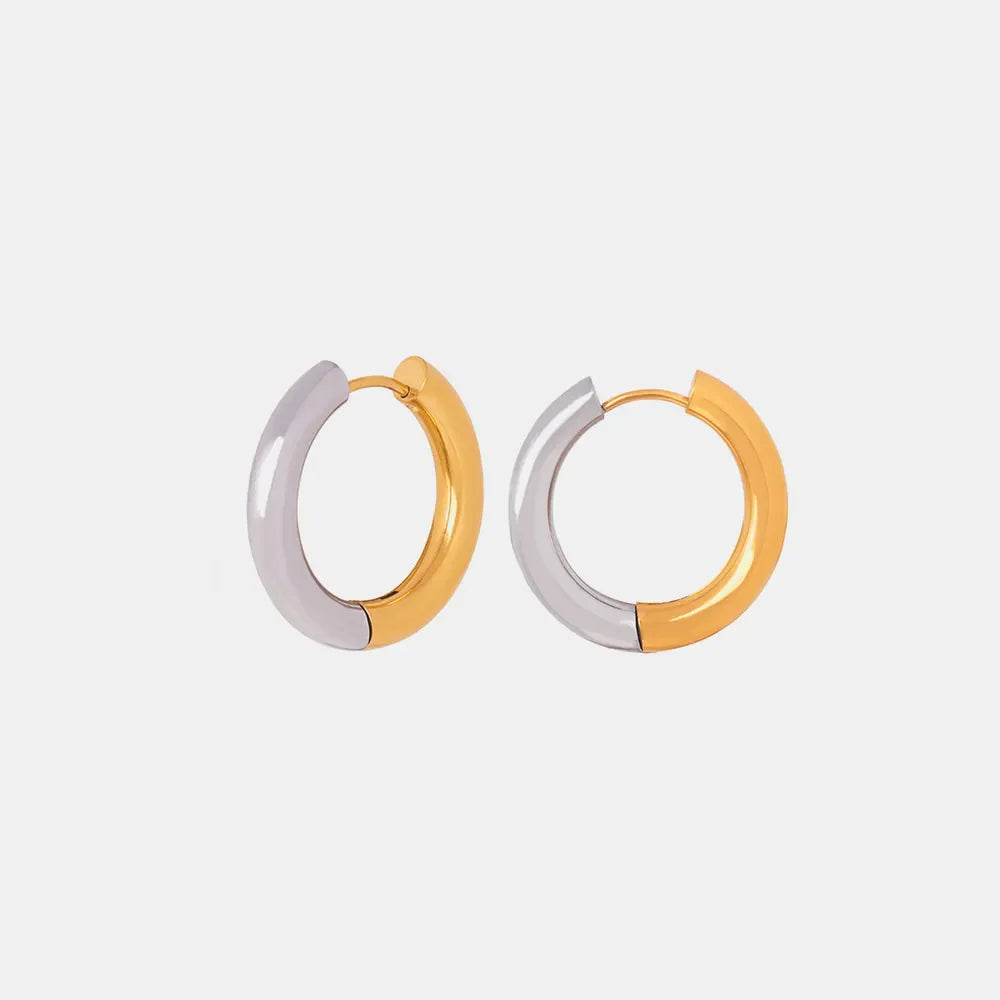 Gold two-tone segmented hoop earrings with a polished finish.