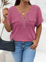 Cerise ribbed knit henley with short sleeves, zip neckline, and chest pockets.