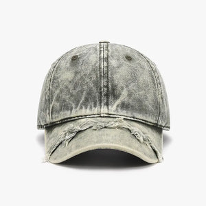 Acid wash distressed baseball cap in a faded grey denim with frayed brim details.
