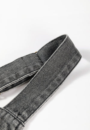 Gray faded denim pinafore dress straps with button detail.