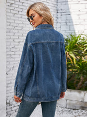 Denim button-up jacket in dusty blue with classic collar and long sleeves.