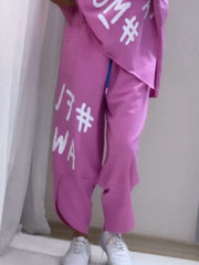 Purple graphic tee and drawstring pants set with white lettering and blue drawstring