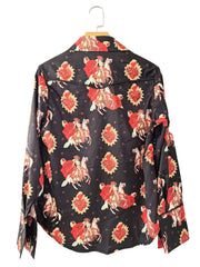 Black long sleeve maternity shirt with rodeo and rose print, polka dot background.