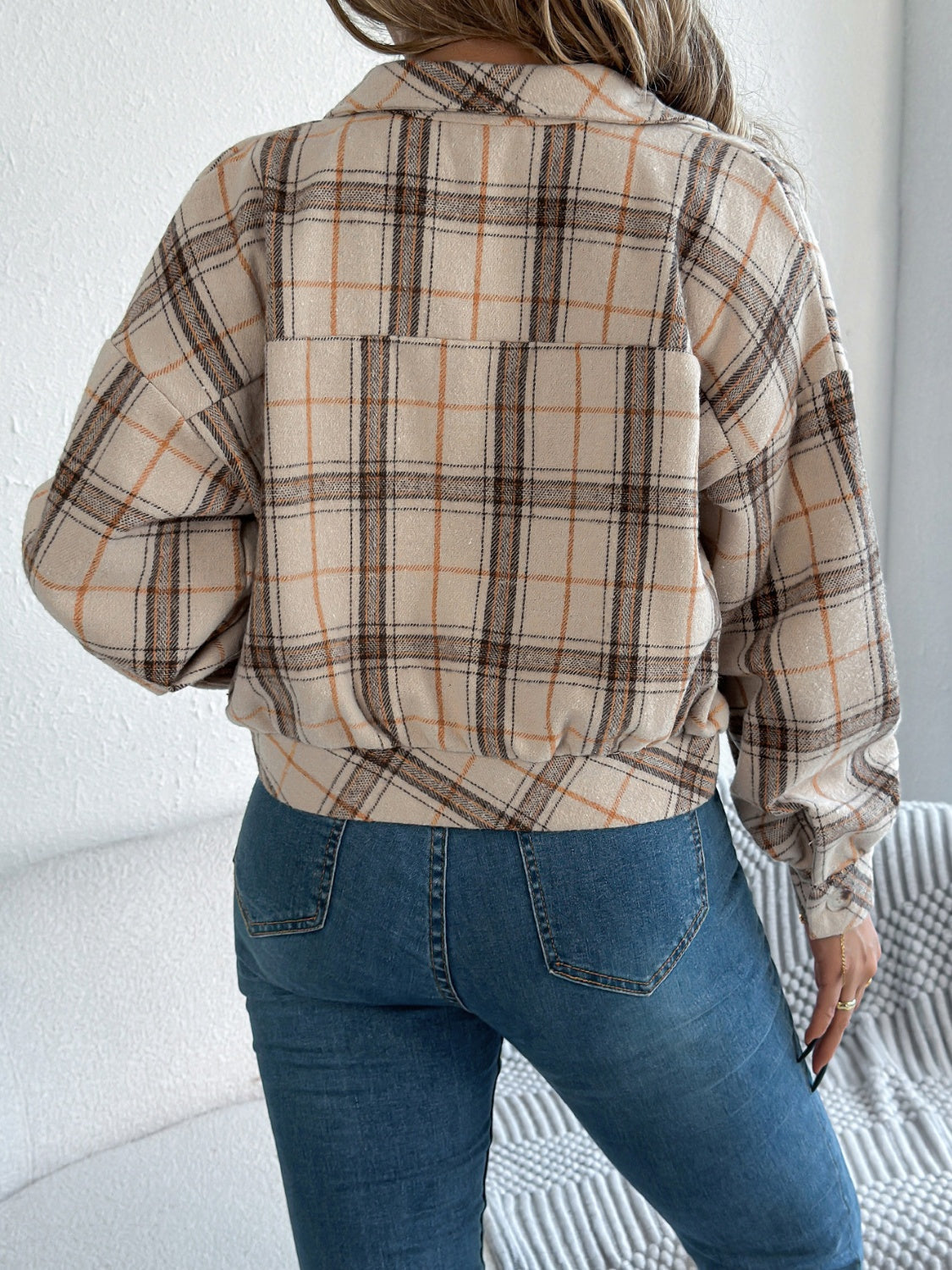 Cropped plaid shacket in Dust Storm with gathered sleeves and buttoned front.