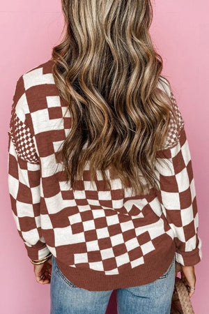 Brown and white geometric knit checkerboard pullover sweater with crew neck.