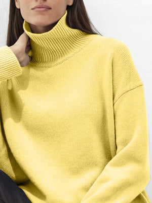 Relaxed fit ribbed turtleneck sweater in Canary Yellow acrylic with a relaxed cut.