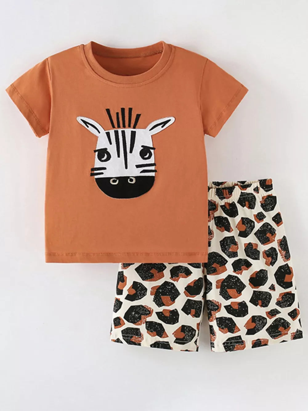 Orange zebra face graphic tee and leopard print shorts baby set