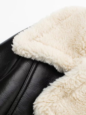 Black aviator jacket with cream shearling trim detail