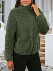 Green sherpa bomber jacket with zip front and stand-up collar.