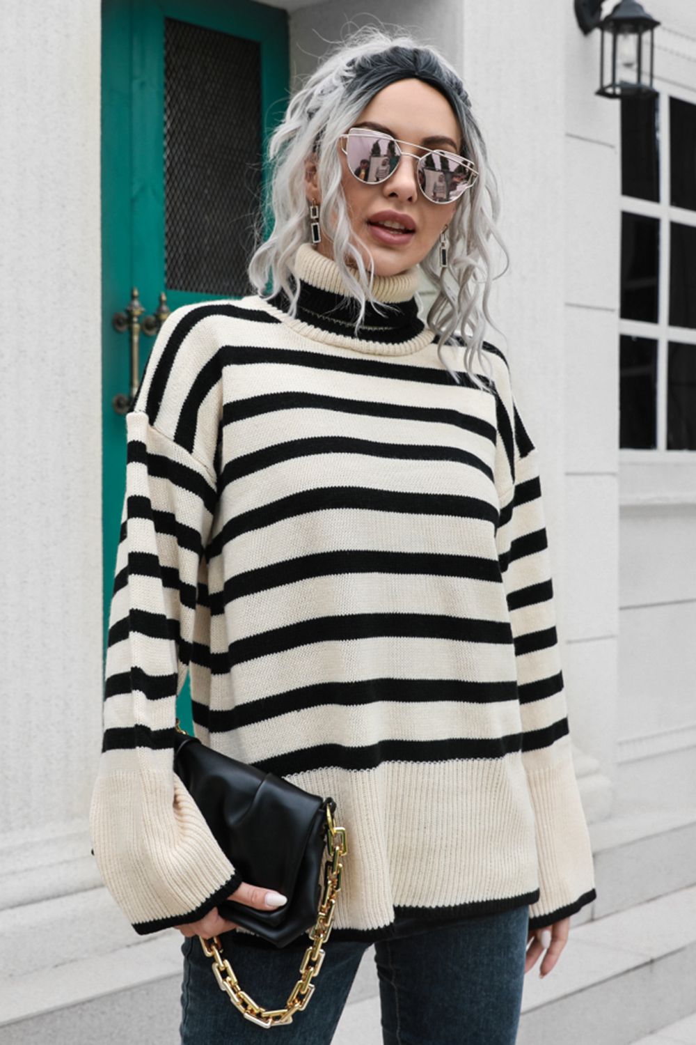 Beige acrylic striped turtleneck sweater with wide bell sleeves and black trim