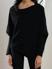 Black off-shoulder drape knit sweater with textured cuffs and batwing sleeves.