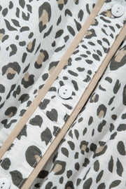 Print Button-down Midi Dress with leopard print, white, beige trim, and white buttons.