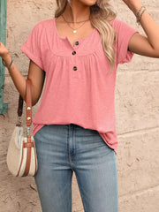 Pink relaxed henley t-shirt with button detail and short sleeves.