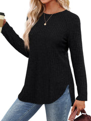 Black ribbed sweater with raglan sleeves and asymmetric hem detail