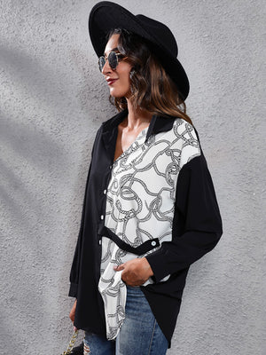 Black and white rope print button-down shirt with black panels and a tie waist.