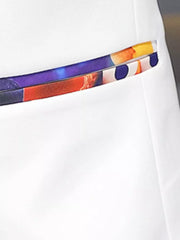 White slim fit blazer with vibrant printed trim detail on pocket.
