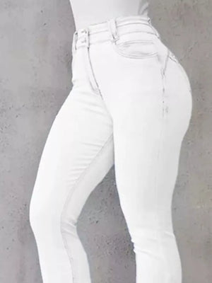 White high-waisted flare jeans with button closure and cotton spandex blend.