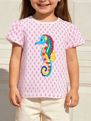 Toddler tee in blush pink with coral pattern and colorful seahorse graphic