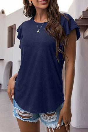 Dark blue t-shirt with ruffled cap sleeves and a crew neck, styled with ripped denim shorts.